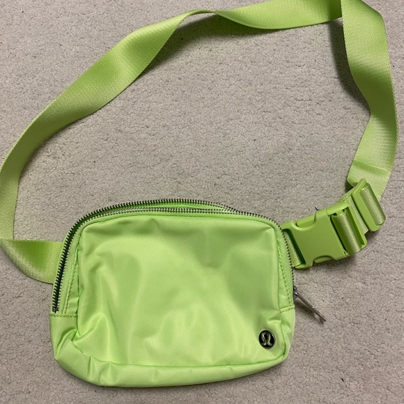 lululemon athletica Handbags - Bright yellow green lululemon everywhere belt bag